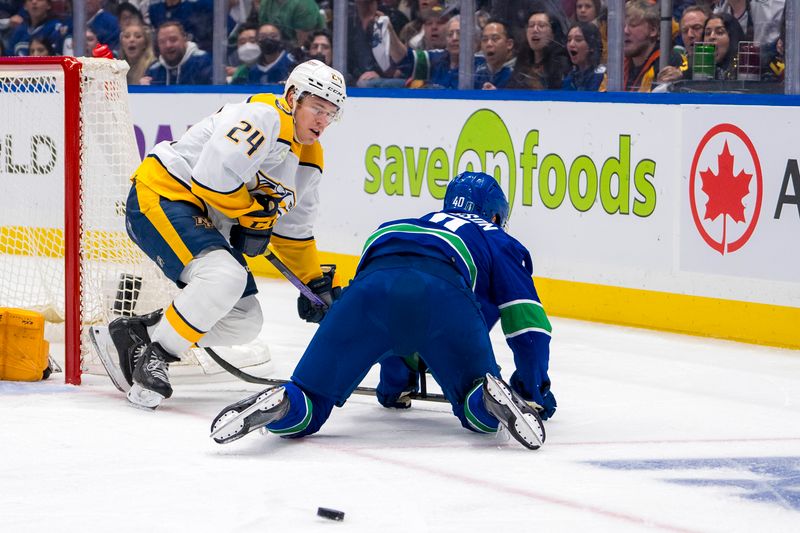 Apr 21, 2024; Vancouver, British Columbia, CAN; Nashville Predators defenseman Spencer Stastney (24) checks Vancouver Canucks forward Elias Pettersson (40) in the first period in game one of the first round of the 2024 Stanley Cup Playoffs at Rogers Arena. Mandatory Credit: Bob Frid-USA TODAY Sports