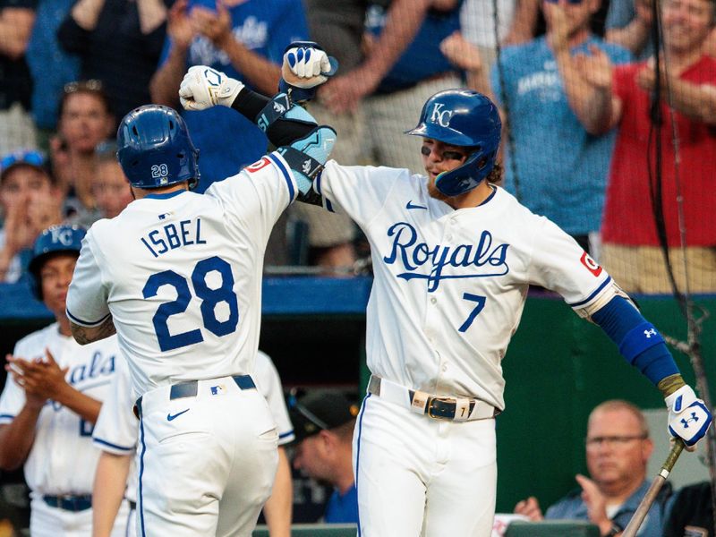 May 18, 2024; Kansas City, Missouri, USA; Kansas City Royals outfielder Kyle Isbel (28) hits elbows with Kansas City Royals shortstop Bobby Witt Jr. (7) after scoring during the seventh inning against the Oakland Athletics at Kauffman Stadium. Mandatory Credit: William Purnell-USA TODAY Sports