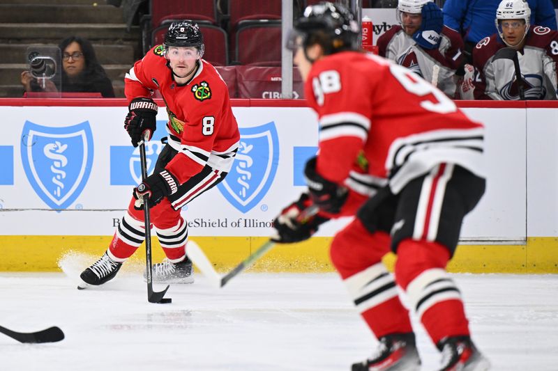 Dec 19, 2023; Chicago, Illinois, USA; Chicago Blackhawks forward Ryan Donato (8) controls the puck in the third period against the Colorado Avalanche at United Center. Mandatory Credit: Jamie Sabau-USA TODAY Sports