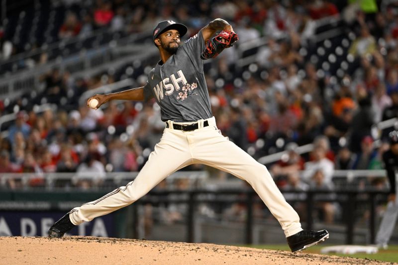 Apr 14, 2023; Washington, District of Columbia, USA; Washington Nationals relief pitcher Carl Edwards Jr. (58) throws to the Cleveland Guardians during the eighth inning at Nationals Park. Mandatory Credit: Brad Mills-USA TODAY Sports