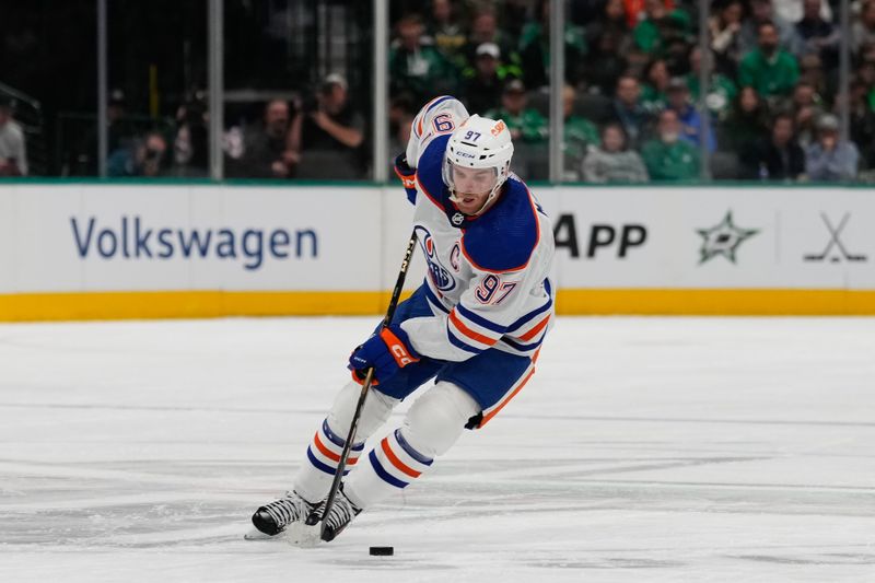 Feb 17, 2024; Dallas, Texas, USA; Edmonton Oilers center Connor McDavid (97) skates with the puck against the Dallas Stars during the first period at American Airlines Center. Mandatory Credit: Chris Jones-USA TODAY Sports