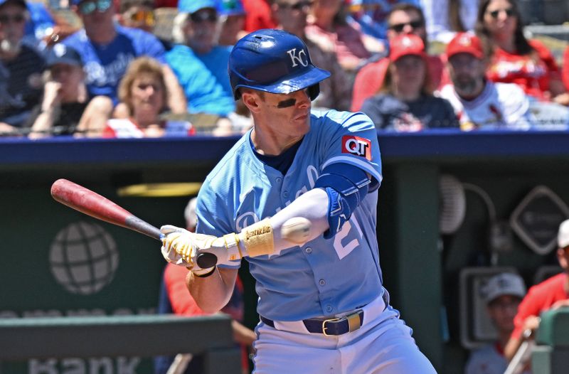 May 18, 2025; Kansas City, Missouri, USA;  Kansas City Royals left fielder Mark Canha (21) gets hit with a pitch in the third inning against the St. Louis Cardinals at Kauffman Stadium. Mandatory Credit: Peter Aiken-Imagn Images