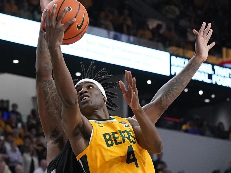 Jan 13, 2024; Waco, Texas, USA; Baylor Bears guard Ja'Kobe Walter (4) shoots over Cincinnati Bearcats forward Jamille Reynolds (13) during the second half at Paul and Alejandra Foster Pavilion. Mandatory Credit: Raymond Carlin III-USA TODAY Sports