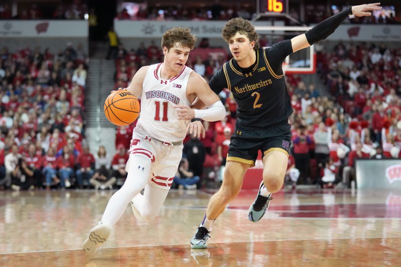 Jan 13, 2024; Madison, Wisconsin, USA; Wisconsin Badgers guard Max Klesmit (11) dribbles the ball against Northwestern Wildcats forward Nick Martinelli (2) during the second half at the Kohl Center. Mandatory Credit: Kayla Wolf-USA TODAY Sports