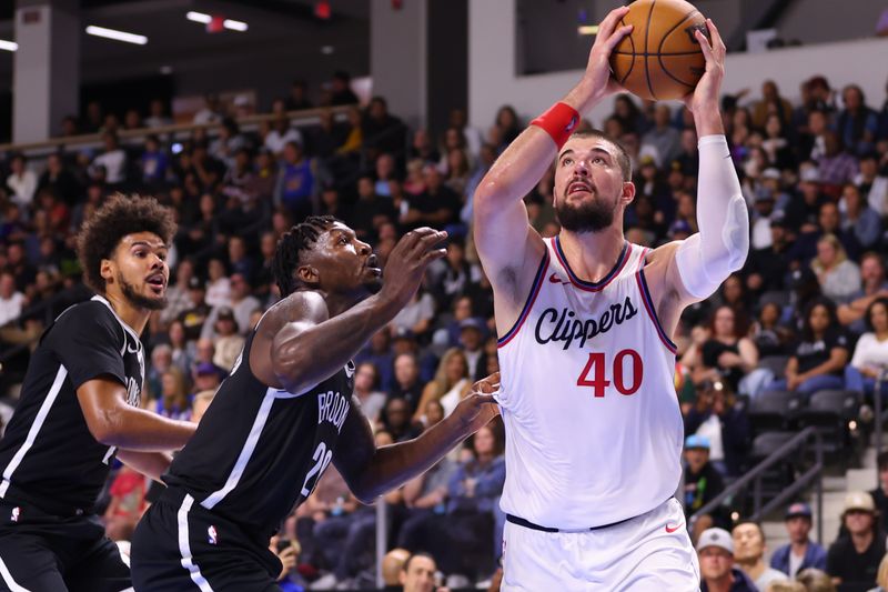 OCEANSIDE, CALIFORNIA - OCTOBER 08: Ivica Zubac #40 of the Los Angeles Clippers takes a shot in the second quarter of the preseason game against the Brooklyn Net at Frontwave Arena on October 08, 2024 in Oceanside, California. NOTE TO USER: User expressly acknowledges and agrees that, by downloading and or using this photograph, User is consenting to the terms and conditions of the Getty Images License Agreement. (Photo by Joe Scarnici/Getty Images)