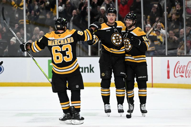 Jan 14, 2025; Boston, Massachusetts, USA; Boston Bruins center Pavel Zacha (18) celebrates with defenseman Nikita Zadorov (91) and left wing Brad Marchand (63) after scoring a goal against the Tampa Bay Lightning during the third period at the TD Garden. Mandatory Credit: Brian Fluharty-Imagn Images