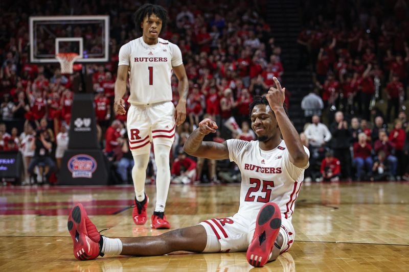 Feb 10, 2024; Piscataway, New Jersey, USA; Rutgers Scarlet Knights guard Jeremiah Williams (25) reacts after making a basking against the Wisconsin Badgers during the second half at Jersey Mike's Arena. Mandatory Credit: Vincent Carchietta-USA TODAY Sports