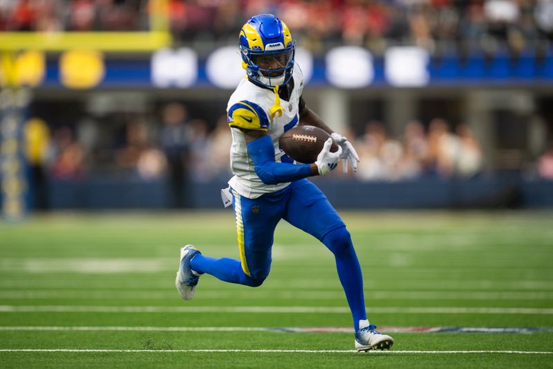 Los Angeles Rams wide receiver Tutu Atwell (5) runs with the ball during an NFL football game against the San Francisco 49ers, Sunday, Sept. 22, 2024, in Inglewood, Calif. (AP Photo/Kyusung Gong)