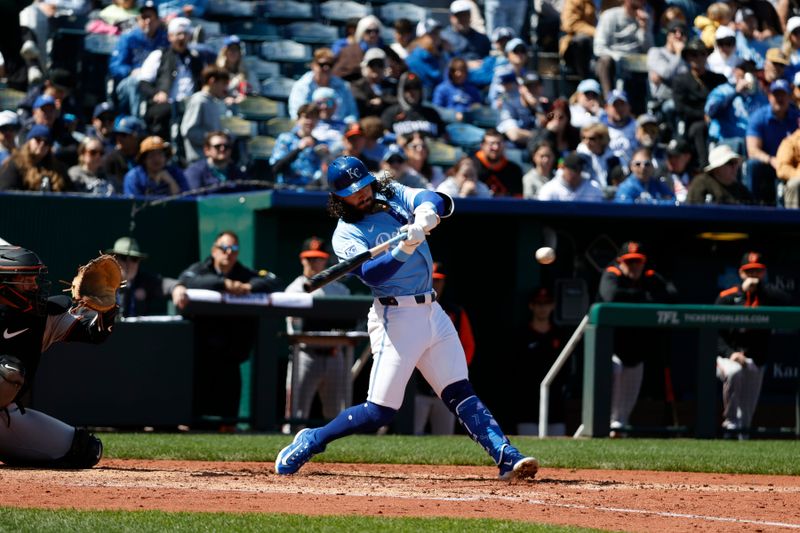 Apr 6, 2025; Kansas City, Missouri, USA;  Kansas City Royals second base Jonathan India (6) hits the ball at Kauffman Stadium. Mandatory Credit: Gary Rohman-Imagn Images