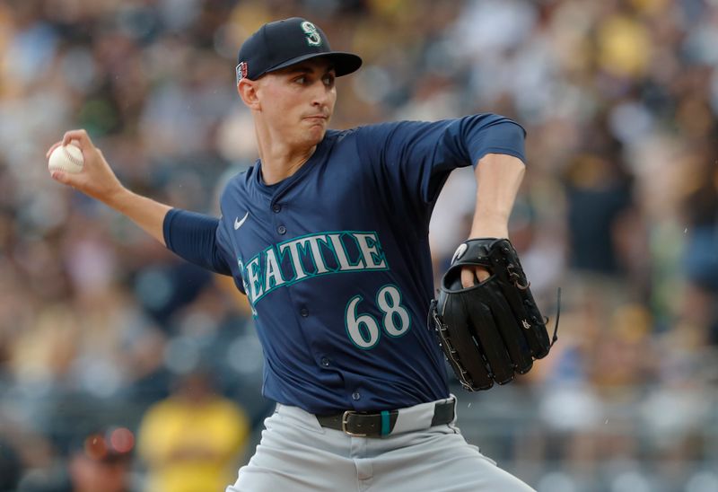 Aug 18, 2024; Pittsburgh, Pennsylvania, USA;  Seattle Mariners starting pitcher George Kirby (68) delivers a pitch against the Pittsburgh Pirates during the first inning at PNC Park. Mandatory Credit: Charles LeClaire-USA TODAY Sports