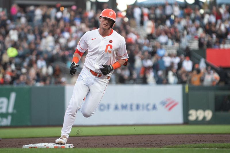 Aug 13, 2024; San Francisco, California, USA;  San Francisco Giants shortstop Tyler Fitzgerald (49) rounds the bases after hitting a home run against the Atlanta Braves during the third inning at Oracle Park. Mandatory Credit: Ed Szczepanski-USA TODAY Sports