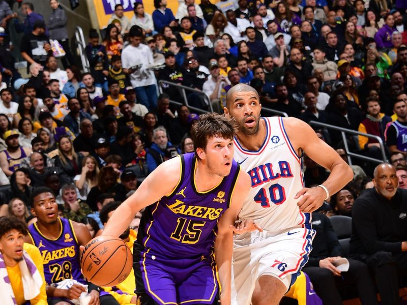 LOS ANGELES, CA - MARCH 22: Austin Reaves #15 of the Los Angeles Lakers dribbles the ball during the game against the Philadelphia 76ers on March 22, 2024 at Crypto.Com Arena in Los Angeles, California. NOTE TO USER: User expressly acknowledges and agrees that, by downloading and/or using this Photograph, user is consenting to the terms and conditions of the Getty Images License Agreement. Mandatory Copyright Notice: Copyright 2024 NBAE (Photo by Adam Pantozzi/NBAE via Getty Images)