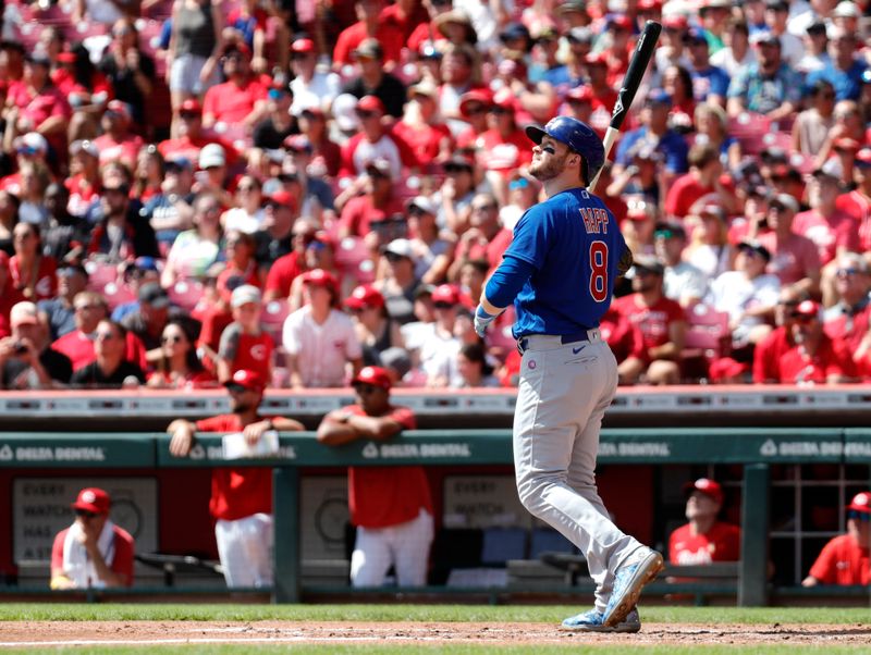 Sep 3, 2023; Cincinnati, Ohio, USA; Chicago Cubs left fielder Ian Happ (8) sacrifices into a double play against the Cincinnati Reds during the second inning at Great American Ball Park. Mandatory Credit: David Kohl-USA TODAY Sports