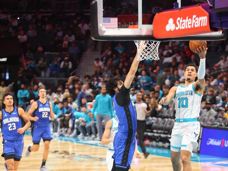 CHARLOTTE, NC - NOVEMBER 25:  Josh Green #10 of the Charlotte Hornets shoots the ball during the game against the Orlando Magic during a regular season game on November 25, 2024 at Spectrum Center in Charlotte, North Carolina. NOTE TO USER: User expressly acknowledges and agrees that, by downloading and or using this photograph, User is consenting to the terms and conditions of the Getty Images License Agreement. Mandatory Copyright Notice: Copyright 2024 NBAE (Photo by Kent Smith/NBAE via Getty Images)