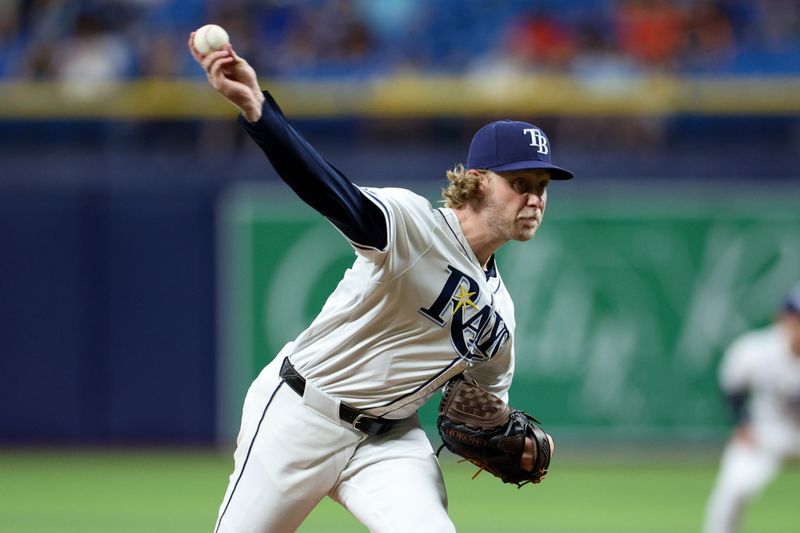 Aug 13, 2024; St. Petersburg, Florida, USA; Tampa Bay Rays pitcher Shane Baz (11) throws a pitch against the Houston Astros in the third inning at Tropicana Field. Mandatory Credit: Nathan Ray Seebeck-USA TODAY Sports