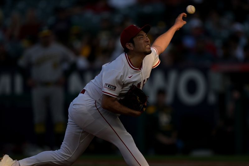 Jun 9, 2025; Anaheim, California, USA;  Los Angeles Angels starting pitcher Yusei Kikuchi (16) delivers to the plate in the second inning against the Athletics at Angel Stadium. Mandatory Credit: Jayne Kamin-Oncea-Imagn Images