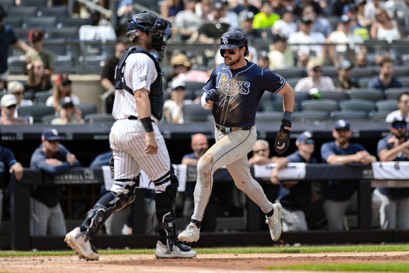 Jul 21, 2024; Bronx, New York, USA; Tampa Bay Rays outfielder Josh Lowe (15) scores on a RBI single by Tampa Bay Rays shortstop José Caballero (not pictured) during the fourth inning against the New York Yankees at Yankee Stadium. Mandatory Credit: John Jones-USA TODAY Sports