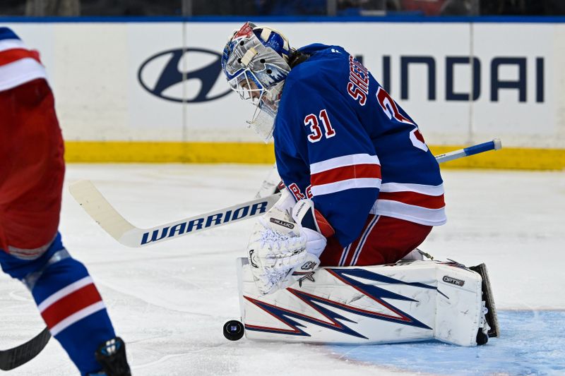 Nov 7, 2024; New York, New York, USA;  New York Rangers goaltender Igor Shesterkin (31) makes a save against the Buffalo Sabres during the first period at Madison Square Garden. Mandatory Credit: Dennis Schneidler-Imagn Images