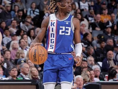 SACRAMENTO, CA - DECEMBER 2: Keon Ellis #23 of the Sacramento Kings dribbles the ball during the game against the Denver Nuggets on December 2, 2023 at Golden 1 Center in Sacramento, California. NOTE TO USER: User expressly acknowledges and agrees that, by downloading and or using this Photograph, user is consenting to the terms and conditions of the Getty Images License Agreement. Mandatory Copyright Notice: Copyright 2023 NBAE (Photo by Rocky Widner/NBAE via Getty Images)