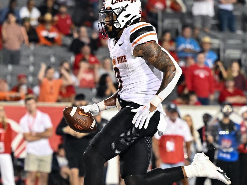 Nov 18, 2023; Houston, Texas, USA; Oklahoma State Cowboys wide receiver Rashod Owens (10) runs the ball into the end zone for a touchdown during the fourth quarter against the Houston Cougars at TDECU Stadium. Mandatory Credit: Maria Lysaker-USA TODAY Sports