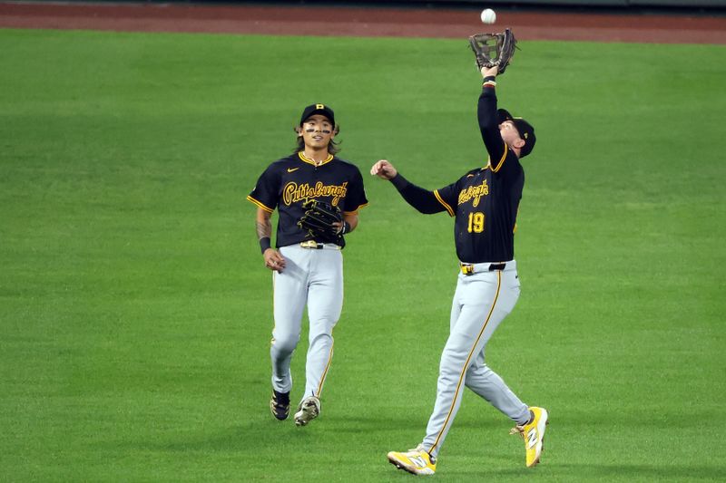 Sep 10, 2025; Baltimore, Maryland, USA; Pittsburgh Pirates shortstop Jared Triolo (19) catches the ball for an out during the fourth inning against the Baltimore Orioles at Oriole Park at Camden Yards. Mandatory Credit: Daniel Kucin Jr.-Imagn Images