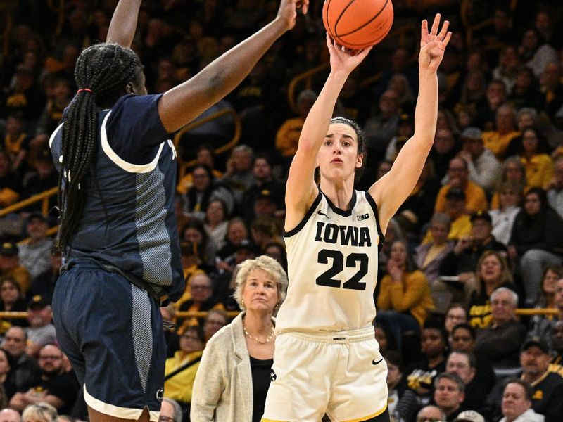 Feb 8, 2024; Iowa City, Iowa, USA; Iowa Hawkeyes guard Caitlin Clark (22) shoots the ball as Penn State Nittany Lions guard Ashley Owusu (0) defends during the second half at Carver-Hawkeye Arena. Mandatory Credit: Jeffrey Becker-USA TODAY Sports