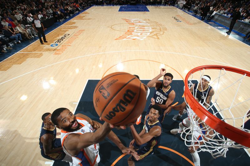 NEW YORK, NY - DECEMBER 1: Mikal Bridges #25 of the New York Knicks drives to the basket during the game against the New Orleans Pelicans on December 1, 2024 at Madison Square Garden in New York City, New York.  NOTE TO USER: User expressly acknowledges and agrees that, by downloading and or using this photograph, User is consenting to the terms and conditions of the Getty Images License Agreement. Mandatory Copyright Notice: Copyright 2024 NBAE  (Photo by Nathaniel S. Butler/NBAE via Getty Images)