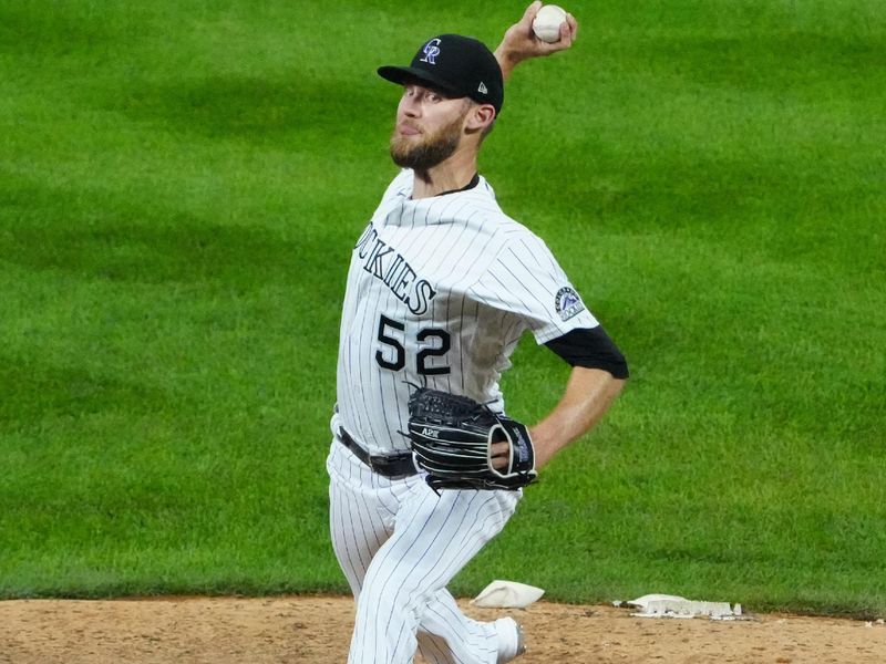 Jul 30, 2022; Denver, Colorado, USA; Colorado Rockies relief pitcher Daniel Bard (52) delivers against the Los Angeles Dodgers in the ninth inning at Coors Field. Mandatory Credit: Ron Chenoy-USA TODAY Sports