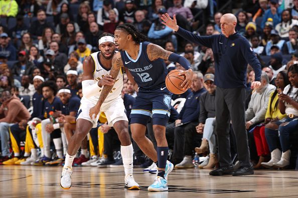 MEMPHIS, TN - DECEMBER 21: Ja Morant #12 of the Memphis Grizzlies handles the ball during the game against the Indiana Pacers on December 21, 2023 at FedExForum in Memphis, Tennessee. NOTE TO USER: User expressly acknowledges and agrees that, by downloading and or using this photograph, User is consenting to the terms and conditions of the Getty Images License Agreement. Mandatory Copyright Notice: Copyright 2023 NBAE (Photo by Joe Murphy/NBAE via Getty Images)