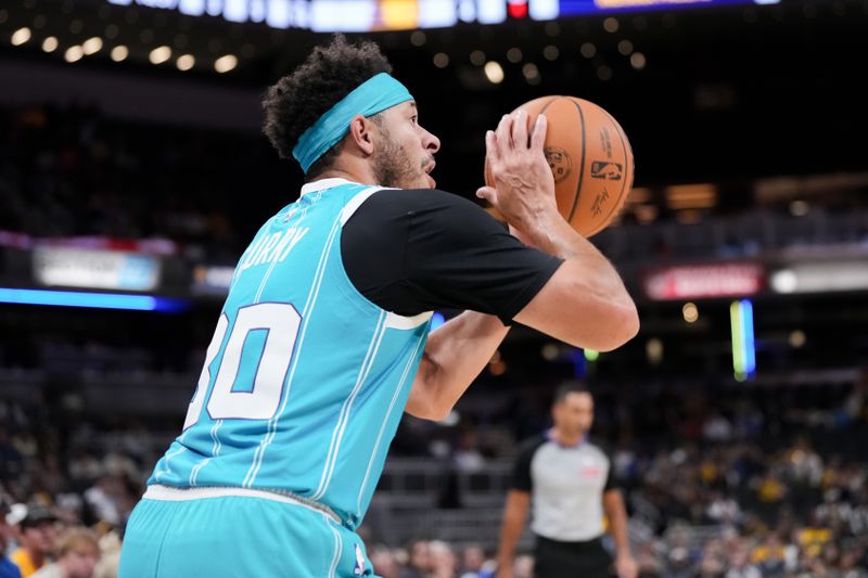 INDIANAPOLIS, INDIANA - OCTOBER 17: Seth Curry #30 of the Charlotte Hornets attempts a shot in the second quarter against the Indiana Pacers during a preseason game at Gainbridge Fieldhouse on October 17, 2024 in Indianapolis, Indiana. NOTE TO USER: User expressly acknowledges and agrees that, by downloading and or using this photograph, User is consenting to the terms and conditions of the Getty Images License Agreement. (Photo by Dylan Buell/Getty Images)