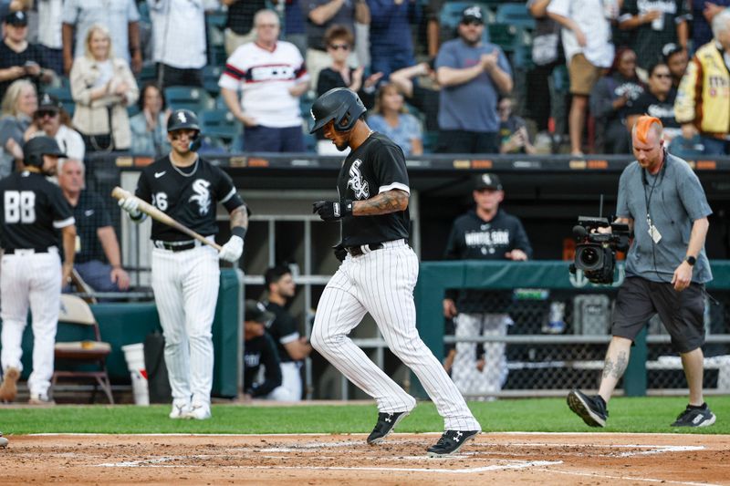 Aug 26, 2023; Chicago, Illinois, USA; Chicago White Sox second baseman Lenyn Sosa (50) crosses home plate after hitting a solo home run against the Oakland Athletics during the second inning at Guaranteed Rate Field. Mandatory Credit: Kamil Krzaczynski-USA TODAY Sports