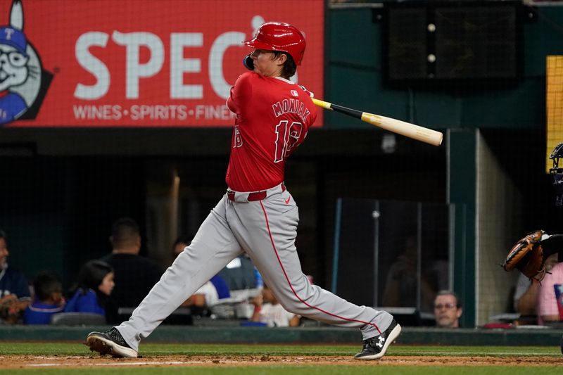 Sep 6, 2024; Arlington, Texas, USA; Los Angeles Angels outfielder Mickey Moniak (16) singles during the sixth inning against the Texas Rangers at Globe Life Field. Mandatory Credit: Raymond Carlin III-Imagn Images