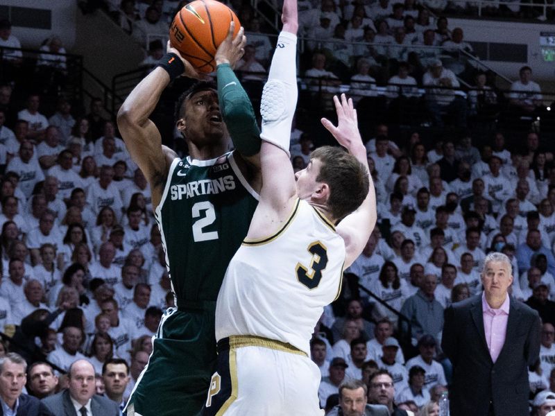 Jan 29, 2023; West Lafayette, Indiana, USA; Michigan State Spartans guard Tyson Walker (2) shoots the ball whilePurdue Boilermakers guard Braden Smith (3) defends in the first half at Mackey Arena. Mandatory Credit: Trevor Ruszkowski-USA TODAY Sports