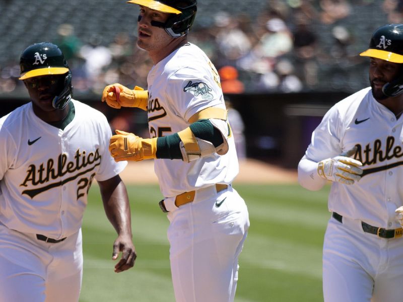 Jul 6, 2024; Oakland, California, USA; Oakland Athletics designated hitter Brent Rooker (25) celebrates his three-run home run against the Baltimore Orioles during the first inning at Oakland-Alameda County Coliseum. Mandatory Credit: D. Ross Cameron-USA TODAY Sports