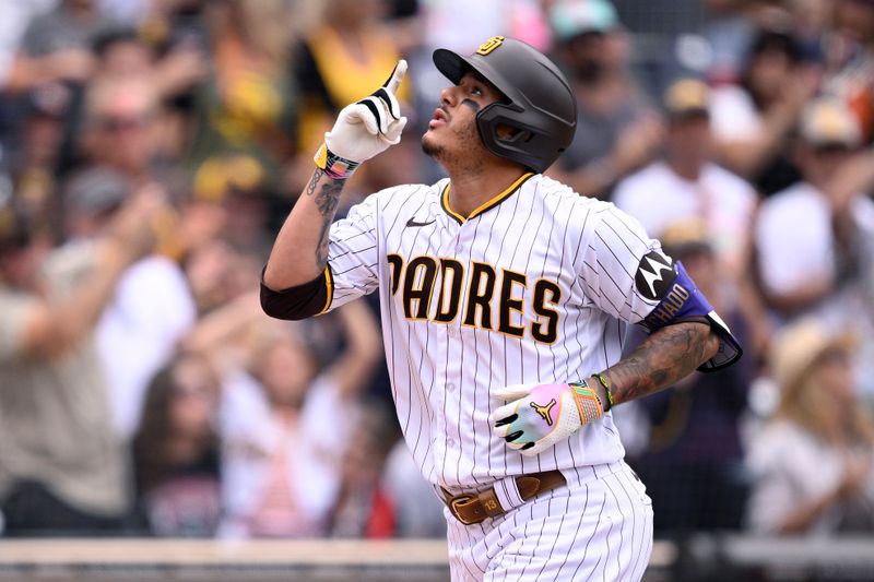 Aug 19, 2023; San Diego, California, USA; San Diego Padres designated hitter Manny Machado (13) celebrates after hitting a home run against the Arizona Diamondbacks during the eighth inning at Petco Park. Mandatory Credit: Orlando Ramirez-USA TODAY Sports