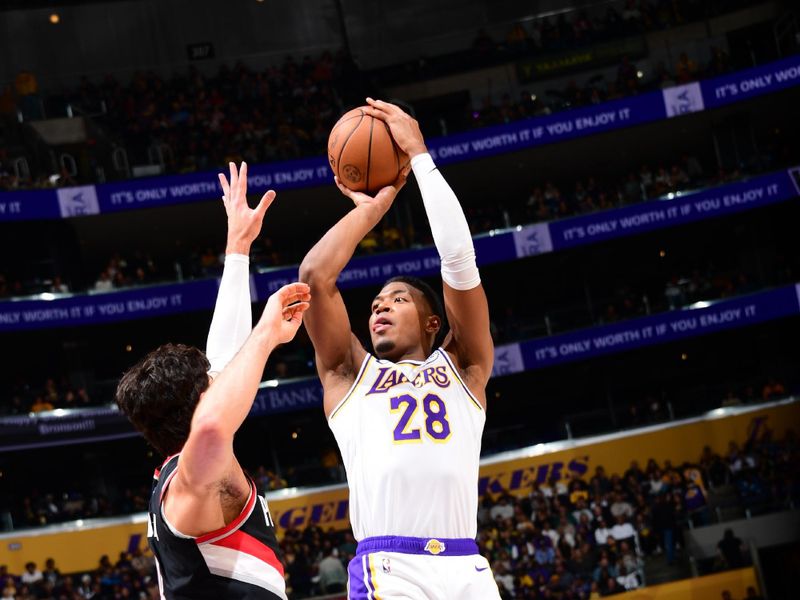 LOS ANGELES, CA - DECEMBER 8: Rui Hachimura #28 of the Los Angeles Lakers shoots the ball during the game against the Portland Trail Blazers on December 8, 2024 at Crypto.Com Arena in Los Angeles, California. NOTE TO USER: User expressly acknowledges and agrees that, by downloading and/or using this Photograph, user is consenting to the terms and conditions of the Getty Images License Agreement. Mandatory Copyright Notice: Copyright 2024 NBAE (Photo by Adam Pantozzi/NBAE via Getty Images)