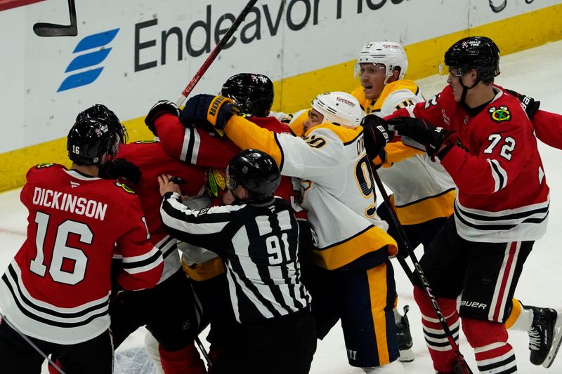 Oct 25, 2024; Chicago, Illinois, USA; The Chicago Blackhawks and the Nashville Predators get into a scrum during the second period at the United Center. Mandatory Credit: David Banks-Imagn Images