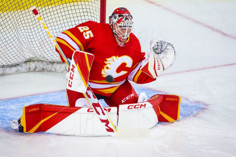 Oct 29, 2022; Calgary, Alberta, CAN; Calgary Flames goaltender Jacob Markstrom (25) guards his net during the warmup period against the Edmonton Oilers at Scotiabank Saddledome. Mandatory Credit: Sergei Belski-USA TODAY Sports