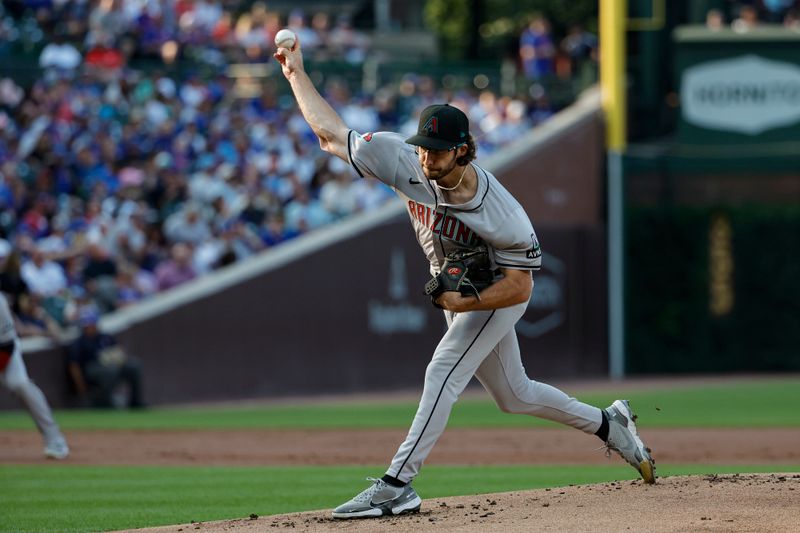 Jul 20, 2024; Chicago, Illinois, USA; Arizona Diamondbacks starting pitcher Zac Gallen (23) delivers against the Chicago Cubs during the first inning at Wrigley Field. Mandatory Credit: Kamil Krzaczynski-USA TODAY Sports