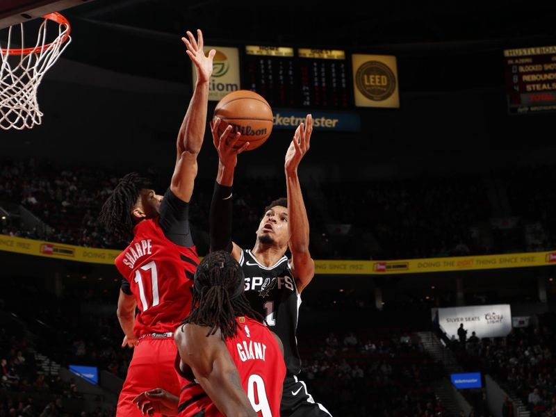 PORTLAND, OR - DECEMBER 13: Victor Wembanyama #1 of the San Antonio Spurs drives to the basket during the game against the Portland Trail Blazers on December 13, 2024 at the Moda Center Arena in Portland, Oregon. NOTE TO USER: User expressly acknowledges and agrees that, by downloading and or using this photograph, user is consenting to the terms and conditions of the Getty Images License Agreement. Mandatory Copyright Notice: Copyright 2024 NBAE (Photo by Cameron Browne/NBAE via Getty Images)