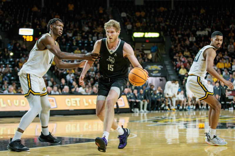 Mar 2, 2024; Wichita, Kansas, USA; Rice Owls forward Max Fiedler (15) drives to the basket during the second half against the Wichita State Shockers at Charles Koch Arena. Mandatory Credit: William Purnell-USA TODAY Sports