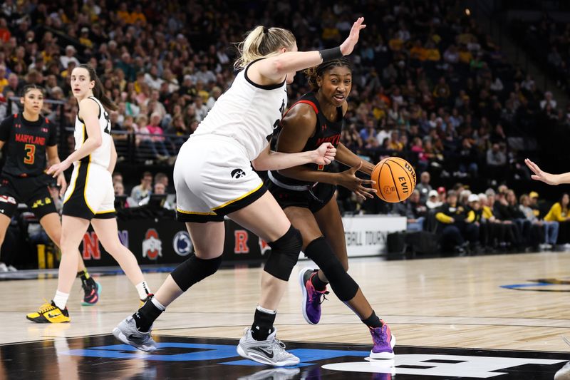 Mar 4, 2023; Minneapolis, MINN, USA; Maryland Terrapins guard Diamond Miller (1) drives to the basket while Iowa Hawkeyes forward Monika Czinano (25) defends during the second half at Target Center. Mandatory Credit: Matt Krohn-USA TODAY Sports