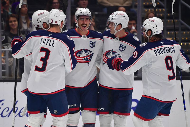 Dec 22, 2025; Los Angeles, California, USA; ;Columbus Blue Jackets celebrate the goal scored by left wing Mason Marchment (17) against the Los Angeles Kings during the first period at Crypto.com Arena. Mandatory Credit: Gary A. Vasquez-Imagn Images