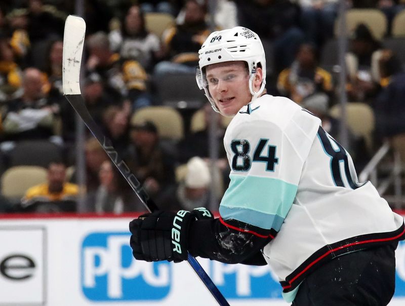 Jan 14, 2025; Pittsburgh, Pennsylvania, USA;  Seattle Kraken right wing Kaapo Kakko (84) reacts after scoring an empty net goal the against the Pittsburgh Penguins during the third period at PPG Paints Arena. Mandatory Credit: Charles LeClaire-Imagn Images