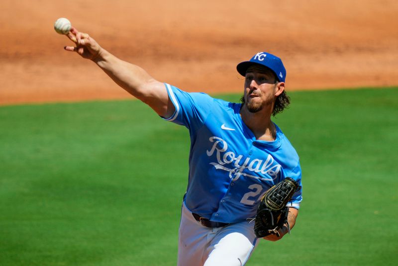 Aug 21, 2025; Kansas City, Missouri, USA; Kansas City Royals starting pitcher Michael Lorenzen (24) pitches during the third inning against the Texas Rangers at Kauffman Stadium. Mandatory Credit: Jay Biggerstaff-Imagn Images