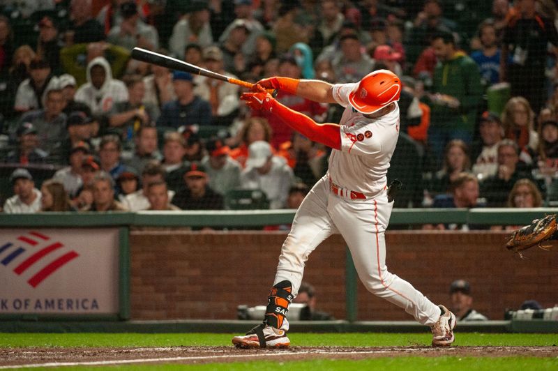 Sep 12, 2023; San Francisco, California, USA; San Francisco Giants catcher Blake Sabol (2) hits a home run during the fifth inning against the Cleveland Guardians at Oracle Park. Mandatory Credit: Ed Szczepanski-USA TODAY Sports