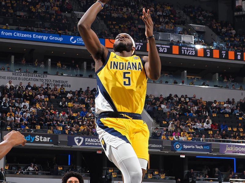 INDIANAPOLIS, IN - OCTOBER 27: Jarace Walker #5 of the Indiana Pacers drives to the basket during the game against the Philadelphia 76ers on October 27, 2024 at Gainbridge Fieldhouse in Indianapolis, Indiana. NOTE TO USER: User expressly acknowledges and agrees that, by downloading and or using this Photograph, user is consenting to the terms and conditions of the Getty Images License Agreement. Mandatory Copyright Notice: Copyright 2024 NBAE (Photo by Ron Hoskins/NBAE via Getty Images)