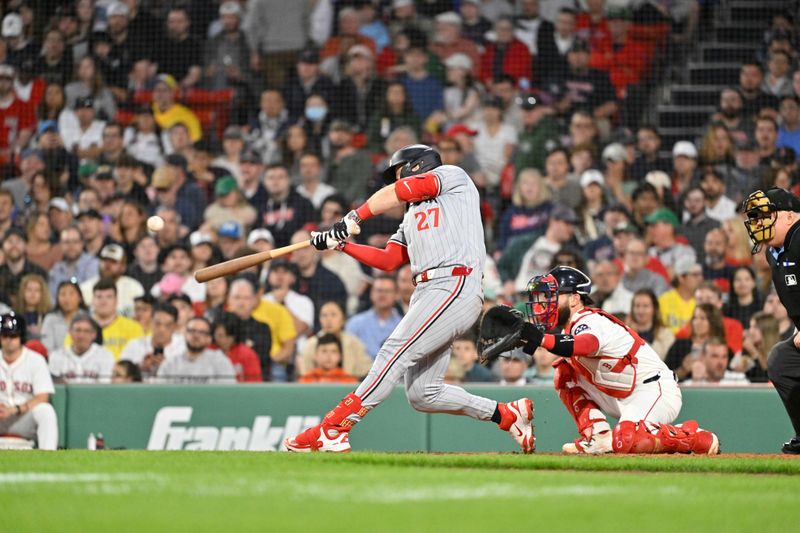 May 2, 2025; Boston, Massachusetts, USA; Minnesota Twins catcher Ryan Jeffers (27) hits a home run against the Boston Red Sox during the third inning at Fenway Park. Mandatory Credit: Eric Canha-Imagn Images