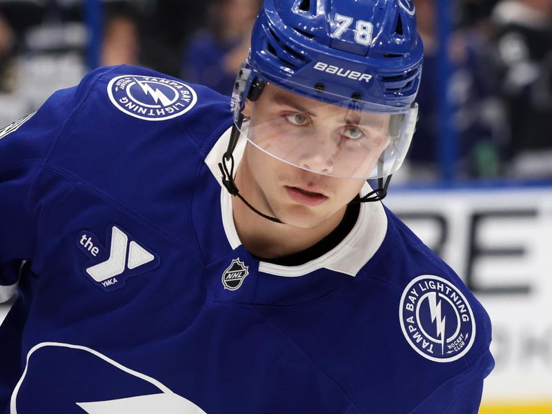 Apr 22, 2025; Tampa, Florida, USA; Tampa Bay Lightning defenseman Emil Lilleberg (78) works out against the Florida Panthers before game one of the first round of the 2025 Stanley Cup Playoffs at Amalie Arena. Mandatory Credit: Kim Klement Neitzel-Imagn Images