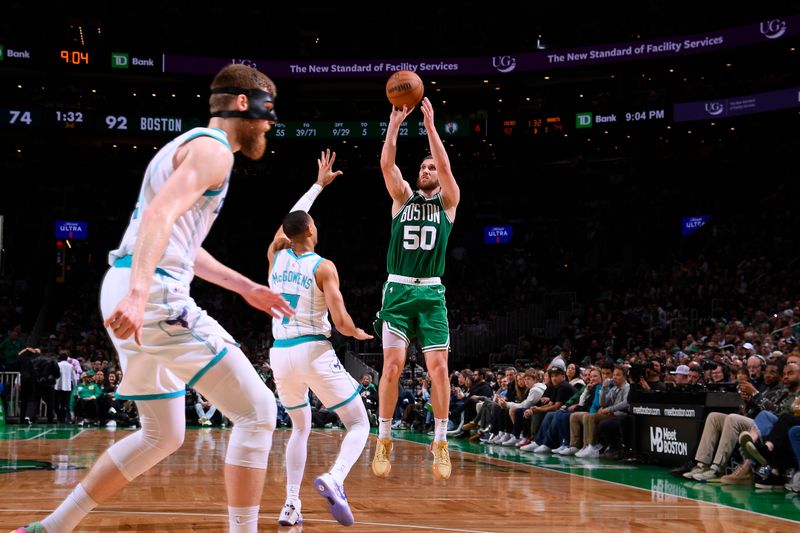 BOSTON, MA - APRIL 12:  Svi Mykhailiuk #50 of the Boston Celtics shoots the ball during the game against the Charlotte Hornets on April 12, 2024 at the TD Garden in Boston, Massachusetts. NOTE TO USER: User expressly acknowledges and agrees that, by downloading and or using this photograph, User is consenting to the terms and conditions of the Getty Images License Agreement. Mandatory Copyright Notice: Copyright 2024 NBAE  (Photo by Brian Babineau/NBAE via Getty Images)